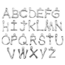 Ocelová komponenta - písmeno