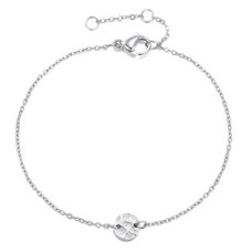 Dámský ocelový náramek s tepaným kolečkem