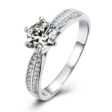 Stříbrný zásnubní prsten s MOISSANITY